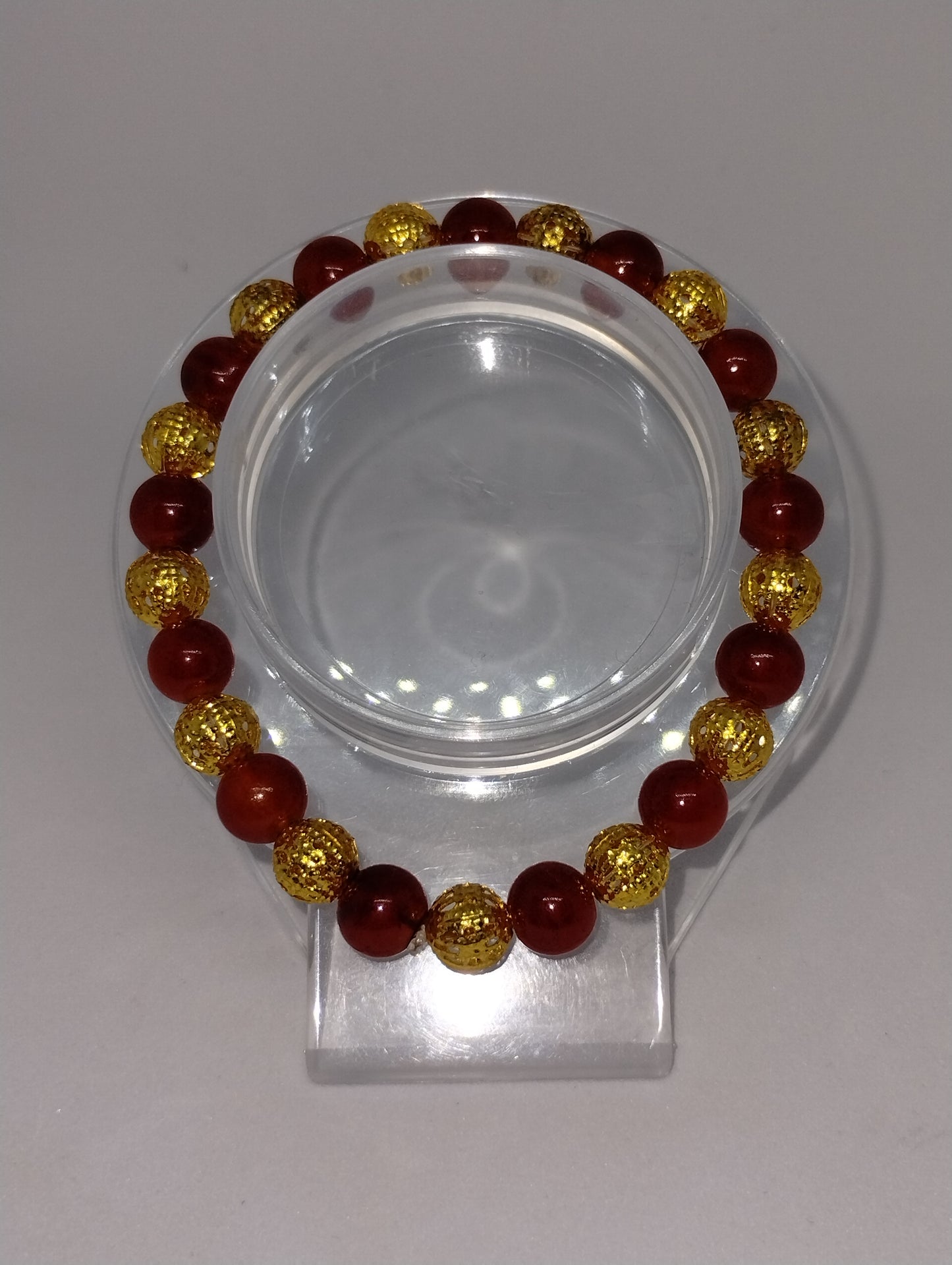 DARK ORANGE AND GOLD BRACELET