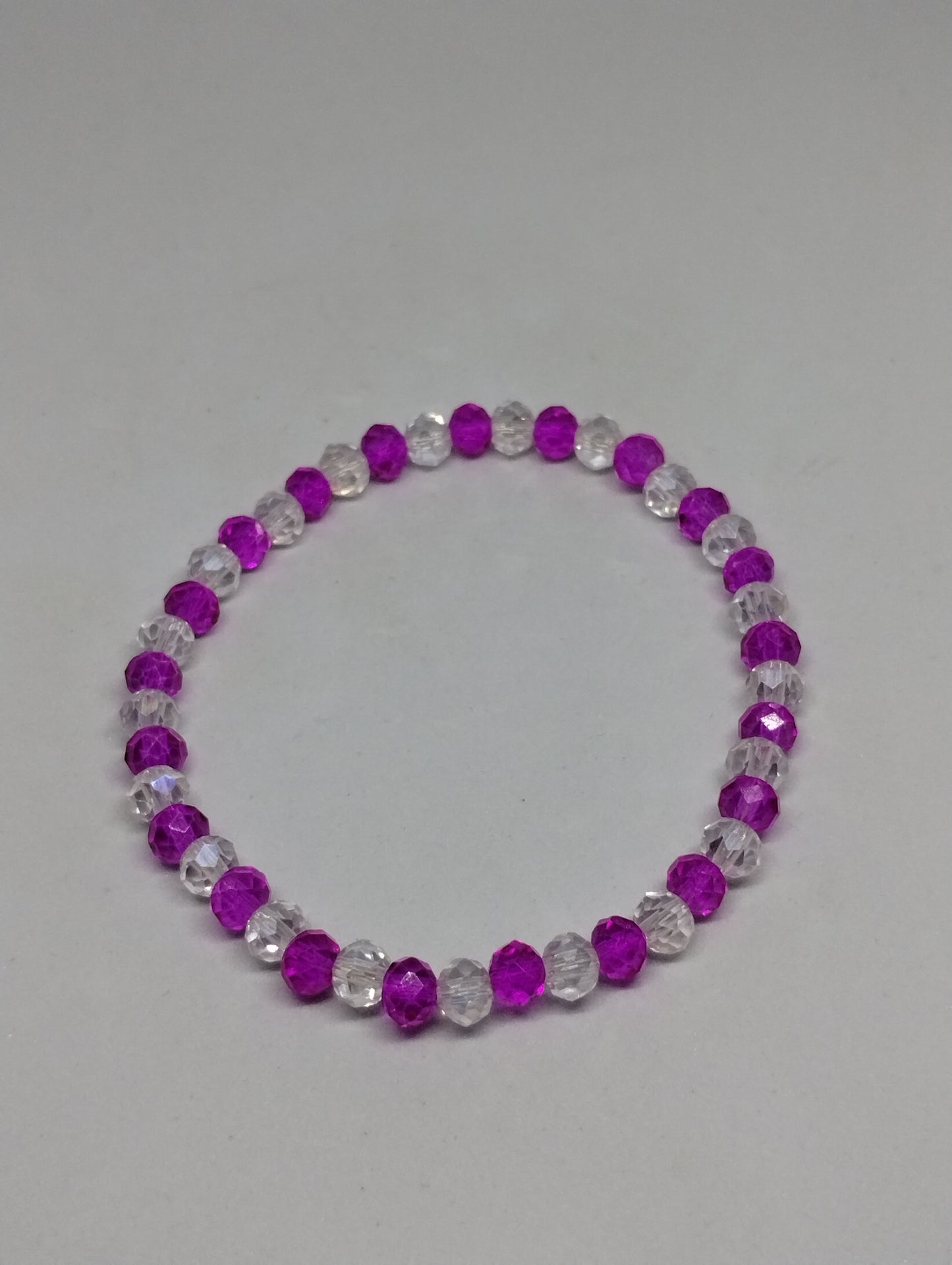 CLEAR AND PINK BRACELET