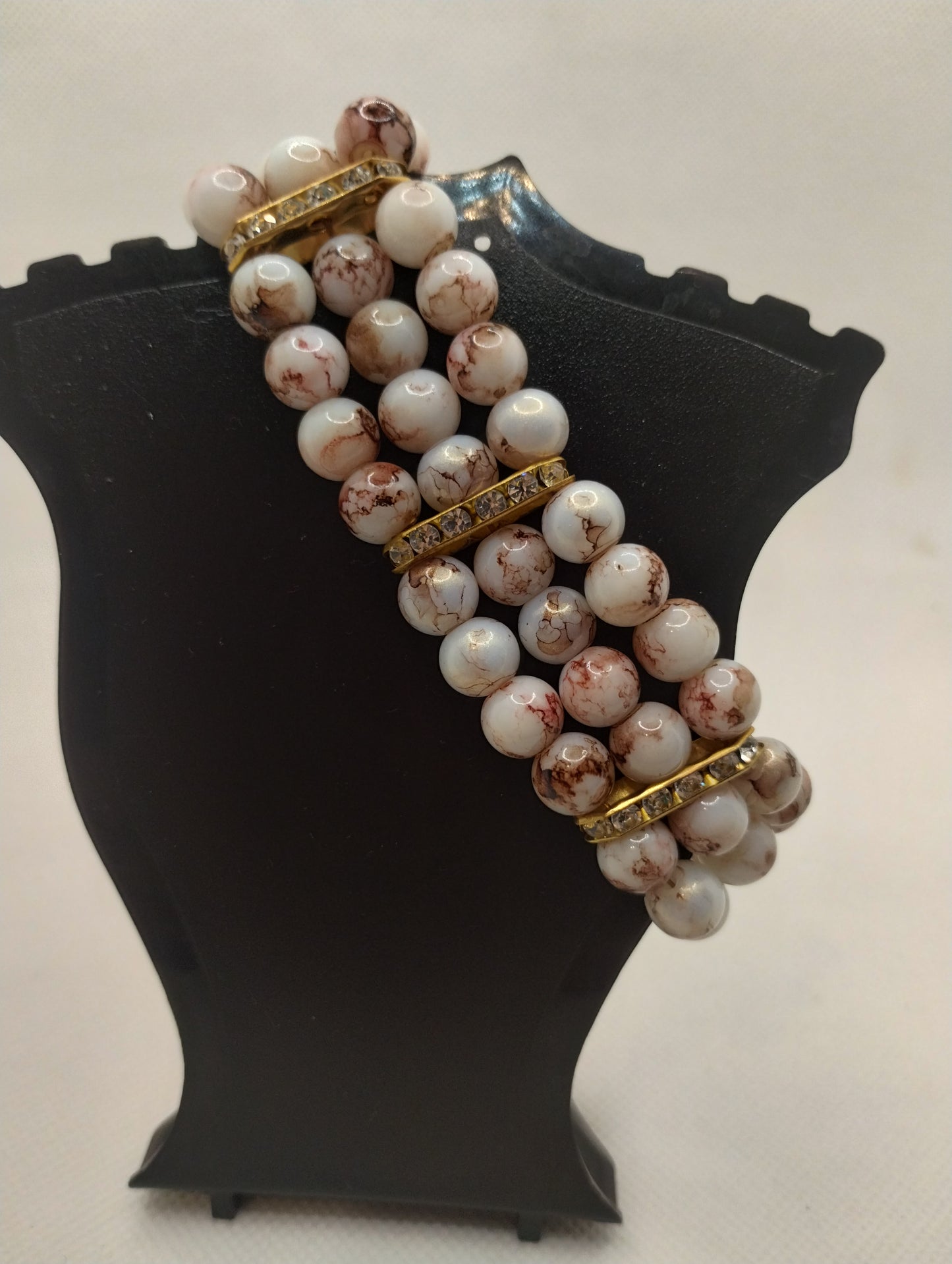 BROWN AND WHITE BRACELET