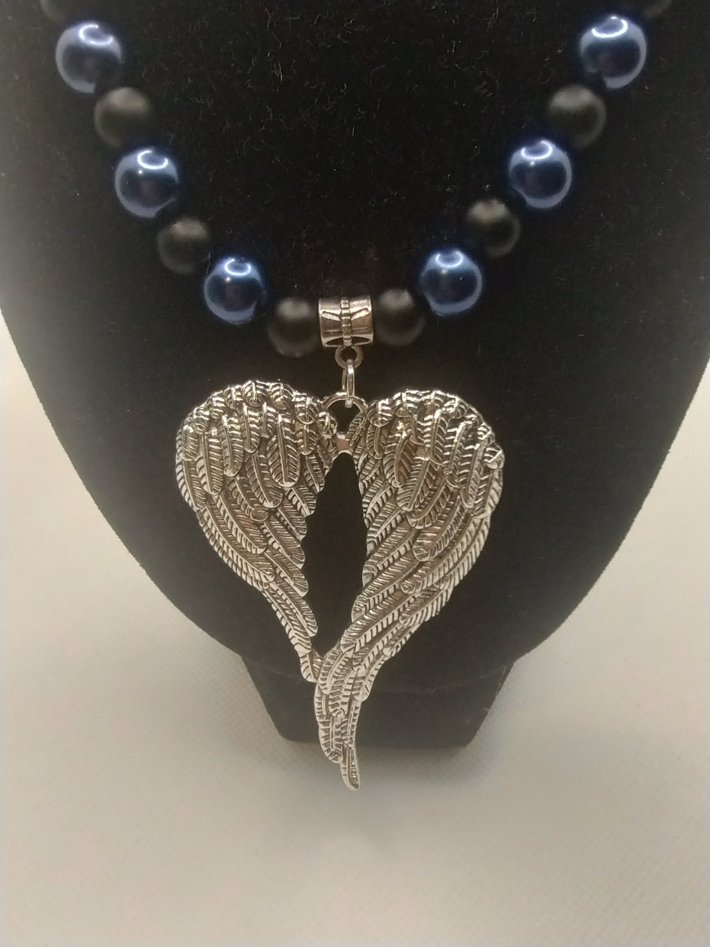 BLACK AND BLUE ANGEL WINGS NECKLACE