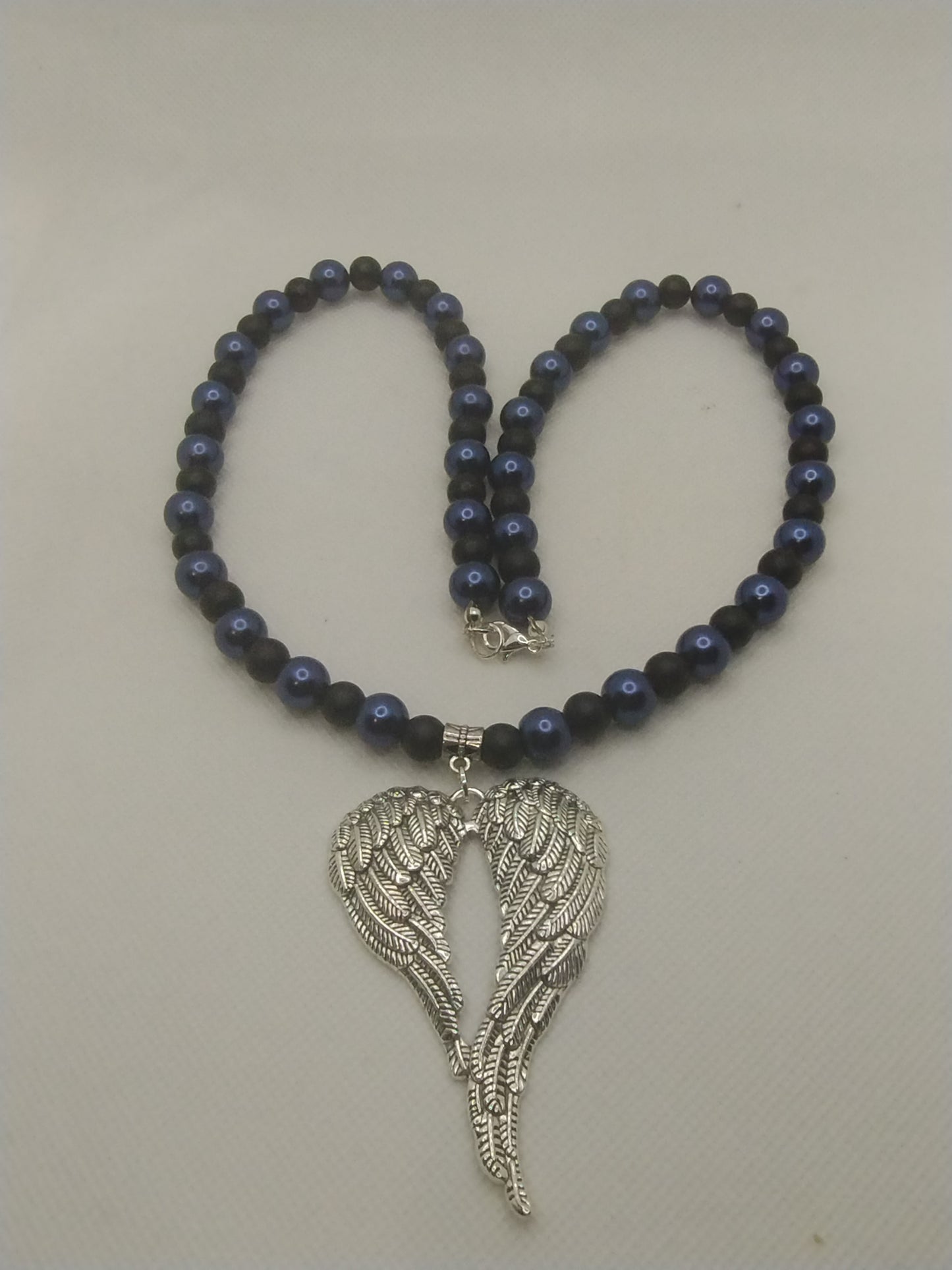 BLACK AND BLUE ANGEL WINGS NECKLACE